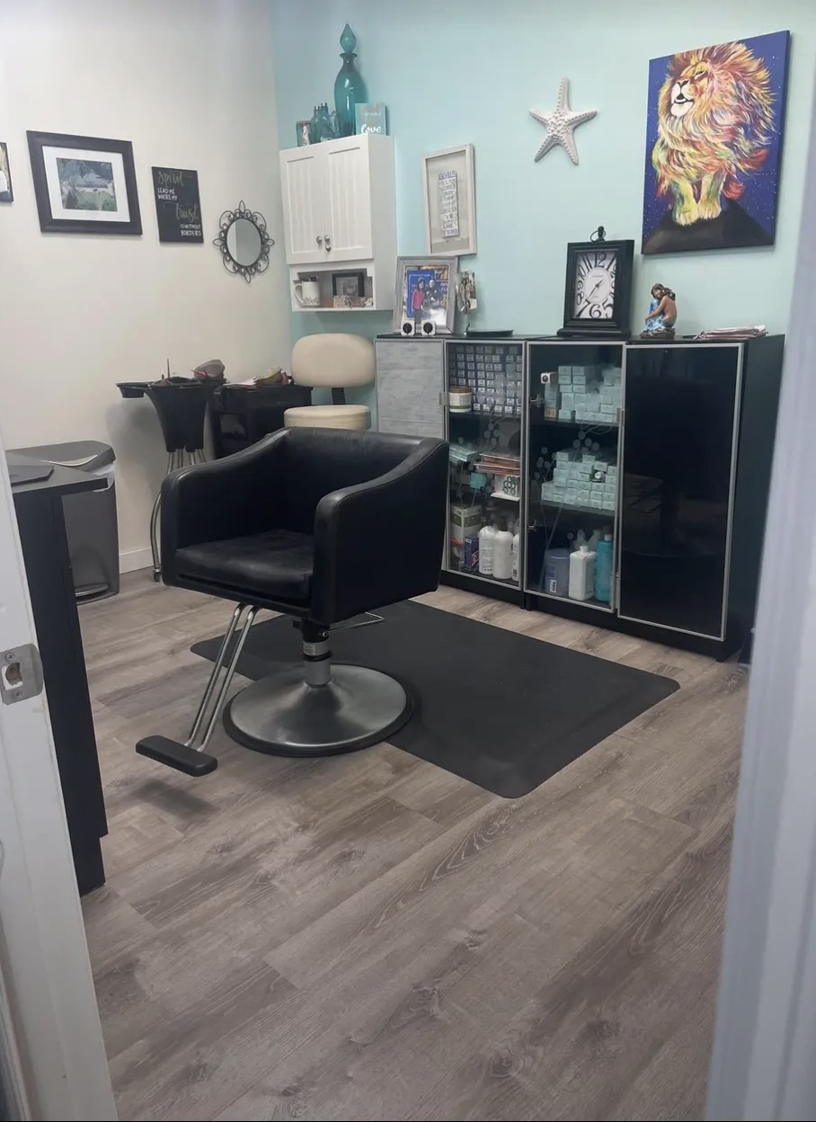 A second styling area inside the Shears of Joy salon