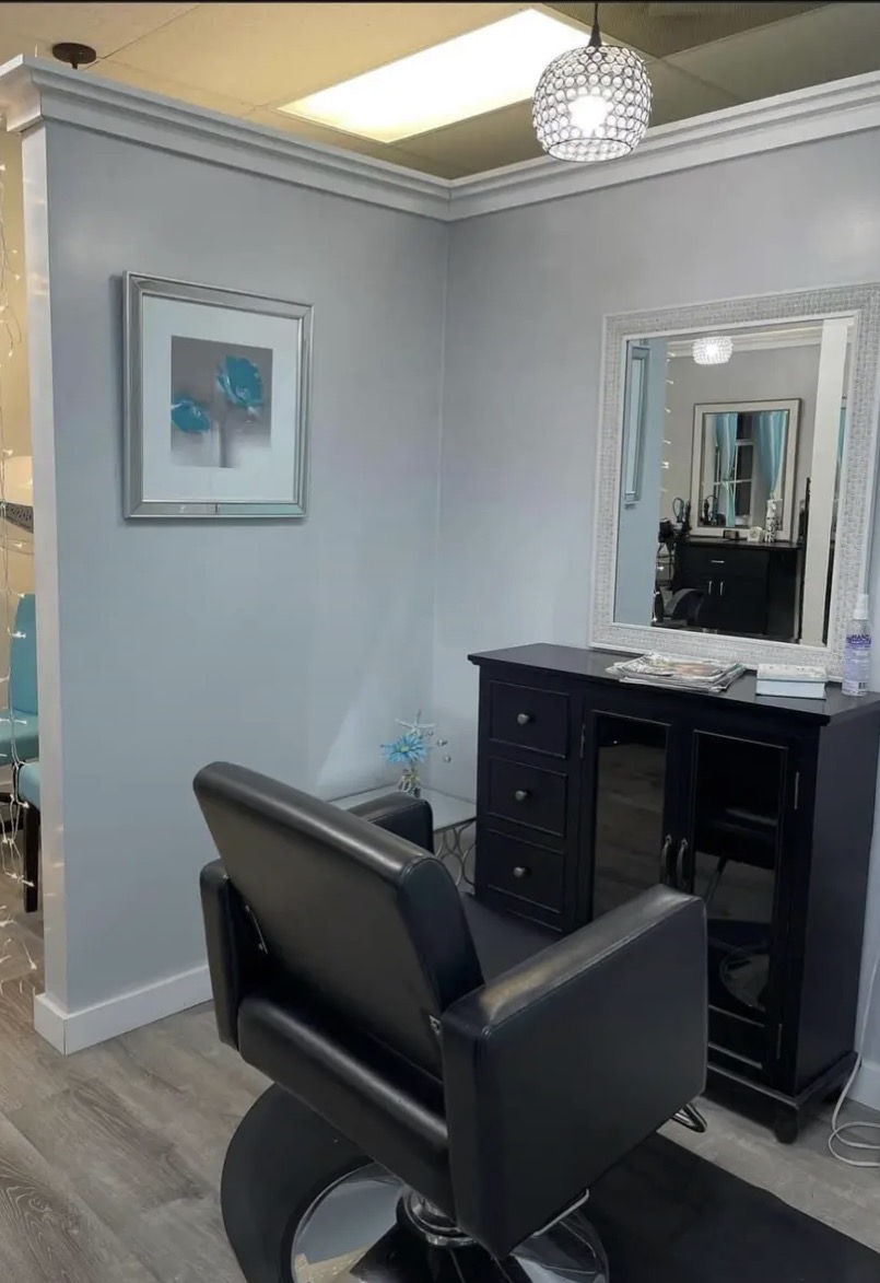 Styling chair and black cabinet inside the Shears of Joy salon